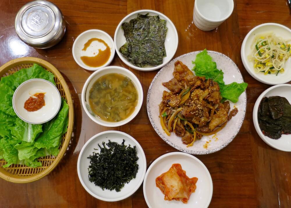 what to eat in seoul - spicy korean pork dish and side dishes