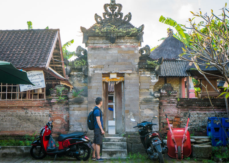 living as a nomad - bali motorcycles temple asian man