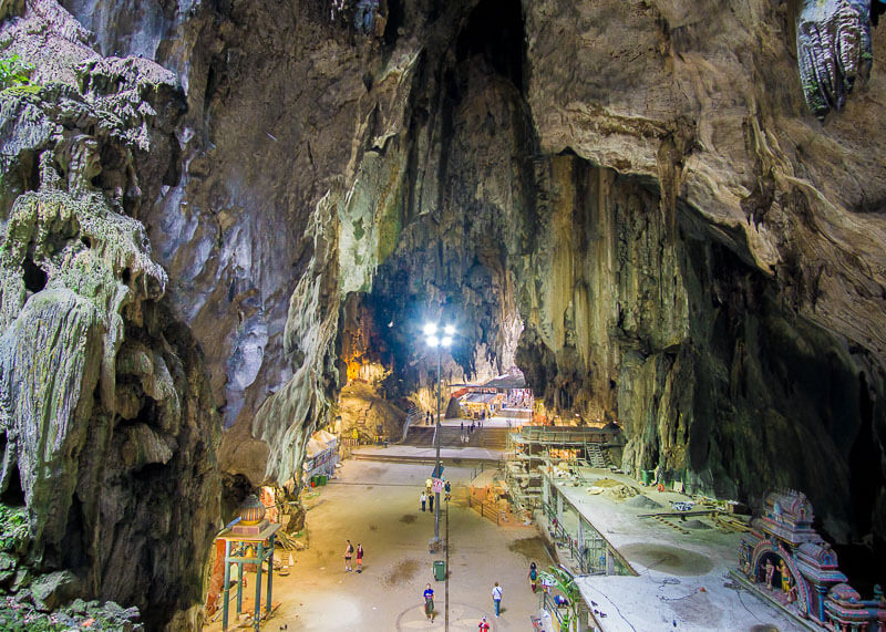 Climbing Batu Caves Steps to See the Famous Temple Cave | Kuala Lumpur has been on my bucket list for over a decade. The street food is incredible, along with the twin towers and the Batu caves. Click to read more and see the photography about the Batu Caves #nomad #batucaves #wanderlust #malaysia #slowtravel