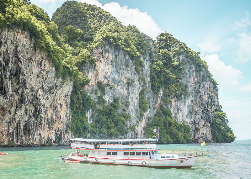 What To Expect On The Famous Phuket James Bond Island Tour | There are tons of things to do in Phuket, especially excursions from the area. If you’re trying to plan how to get from one place to the next during your vacation or honeymoon, you will want to read this post on your travel options! #travel #destinations #thailand #jamesbondisland #phuket #slowtravel #wanderlust