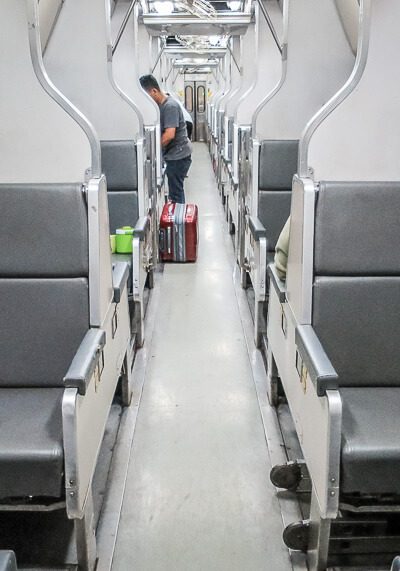 the Surat Thani to Bangkok train ride - train people getting ready