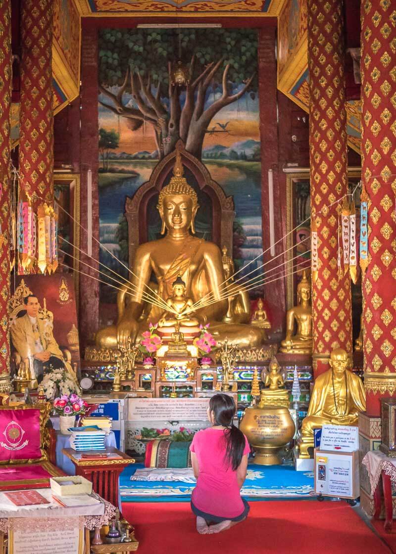 living in chiang mai thailand - temple with buddha